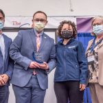 Photo Receiving award Student Symposium 2022 award ceremony