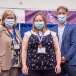 Photo Receiving award Student Symposium 2022 award ceremony