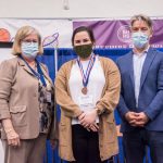 Photo Receiving award Student Symposium 2022 award ceremony