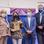 Photo Receiving award Student Symposium 2022 award ceremony