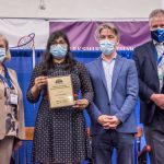 Photo Receiving award Student Symposium 2022 award ceremony